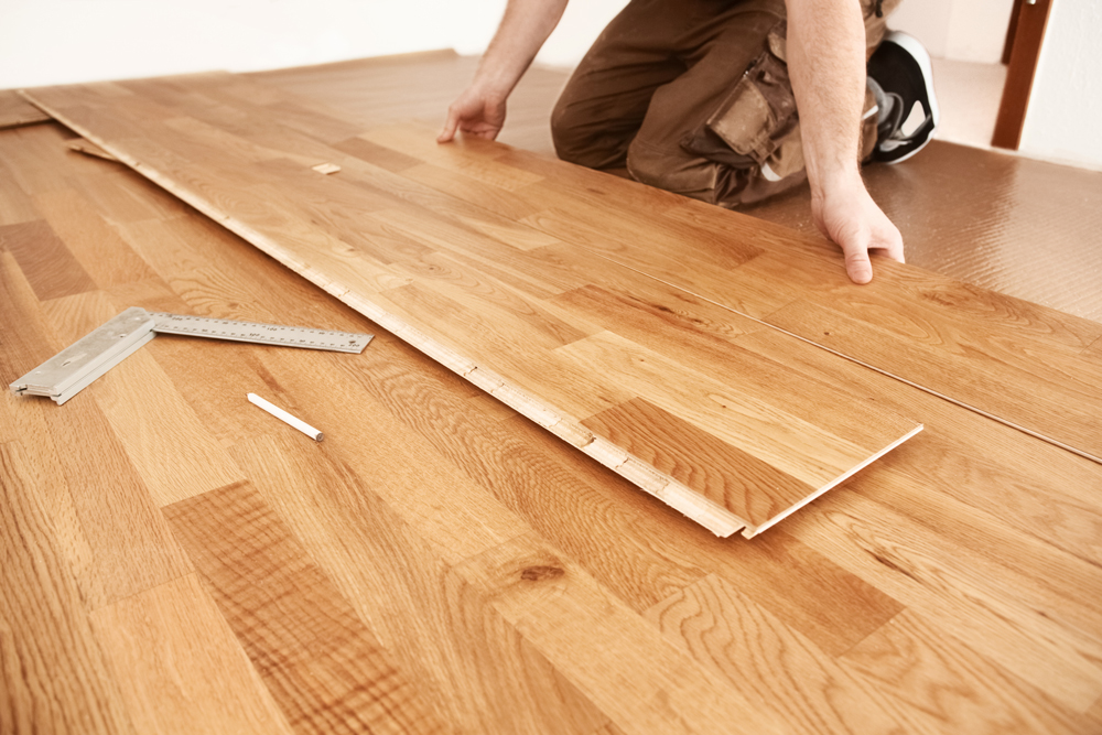 Fitting timber laminate flooring